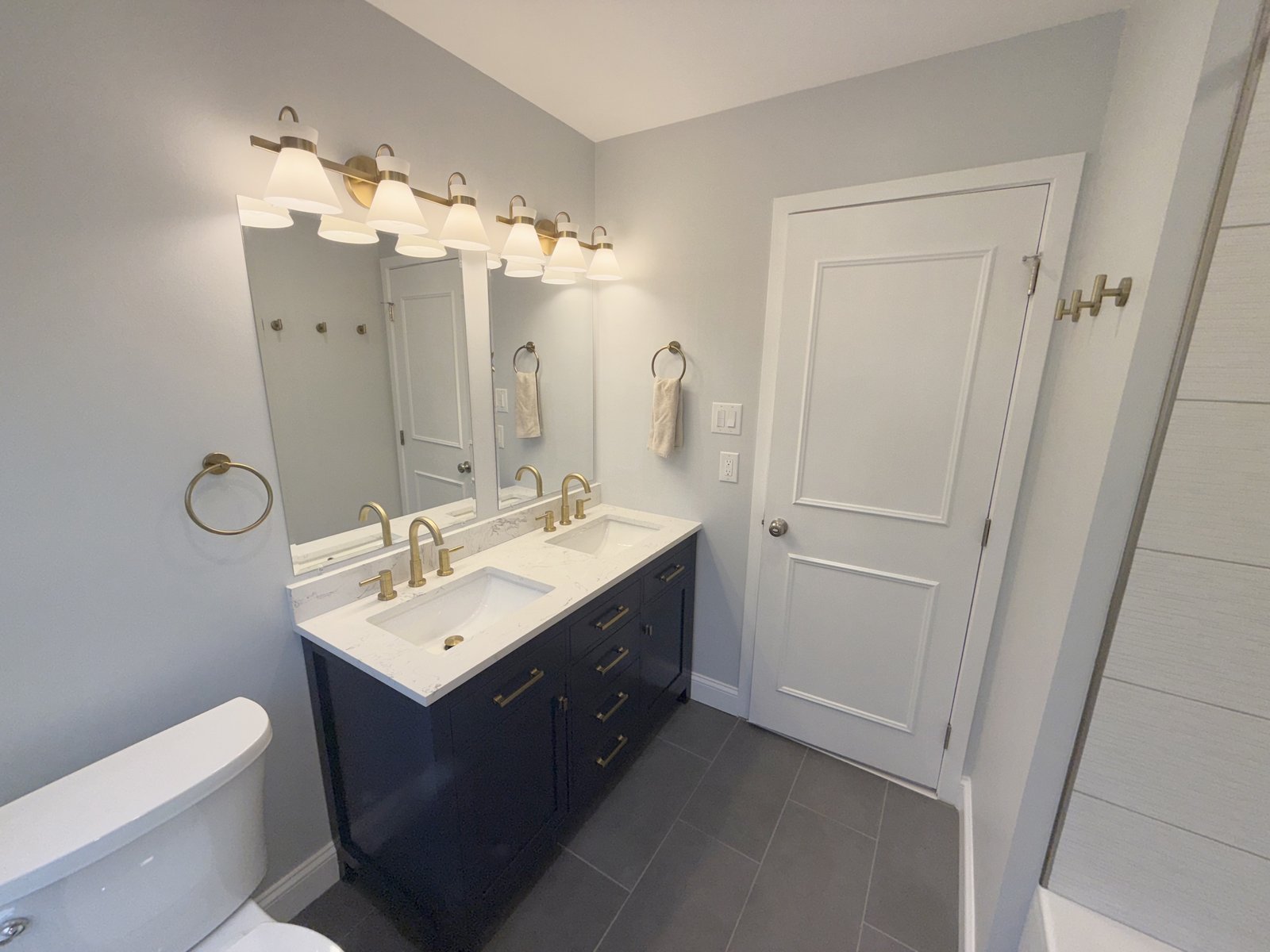 Bathroom double vanity navy cabinets West Chester